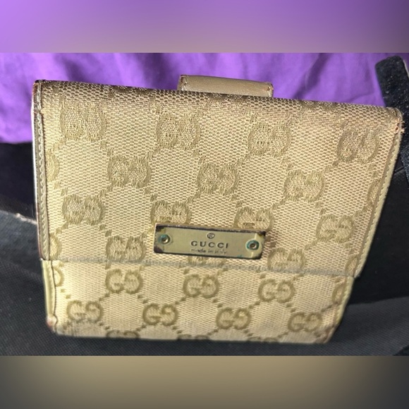 Gucci Handbags - Gucci Beige Monogram Canvas Bi-Fold Wallet with Gold Plate